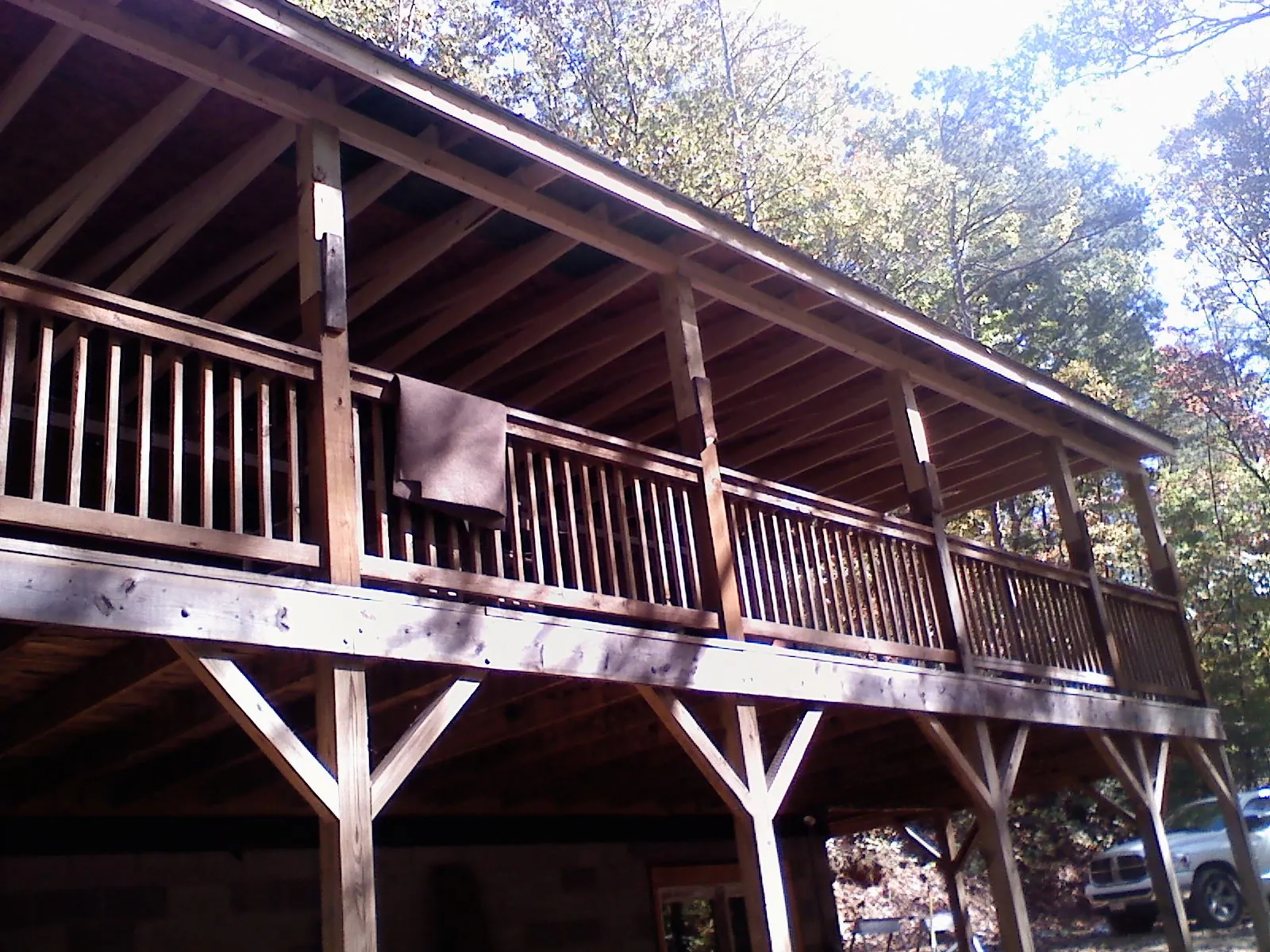 Timber framing under a new elevated porch and deck — Roof Leak Repair in Clendenin by Roofing Brothers